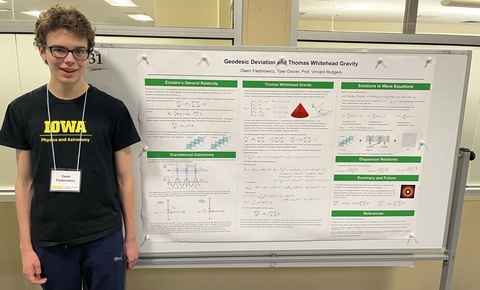 Owen Fiedorowicz presents a physics poster