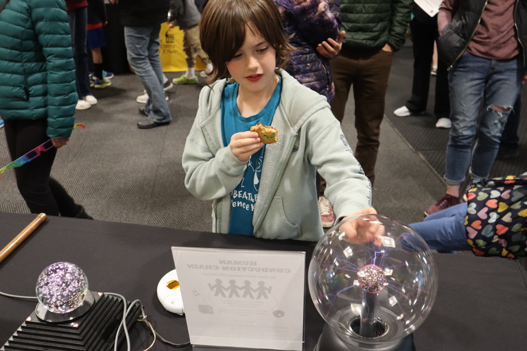 A child with a science demo