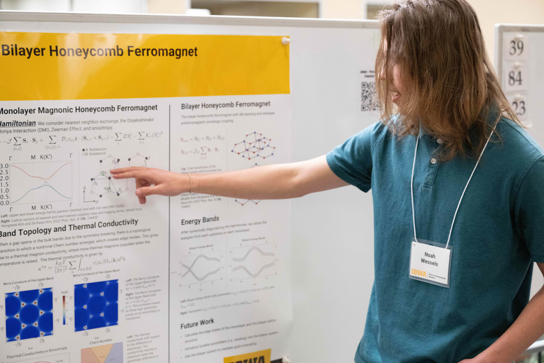 Noah Wessels presents a poster at Spring Undergraduate Research Festival 2024 