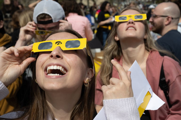 students view eclipse on the pentacrest