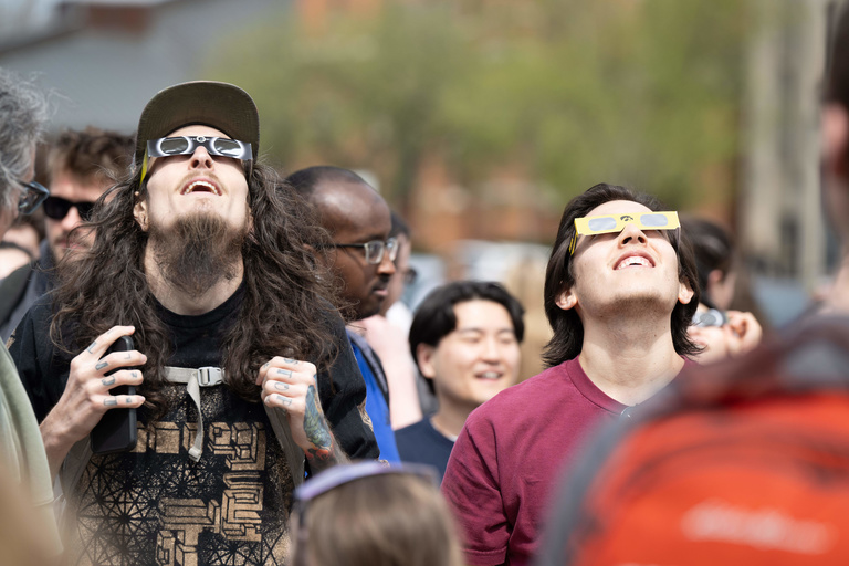 Grad students watch the eclipse