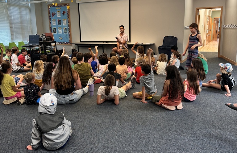Casey DeRoo talks to students at Willowwind School summer camp