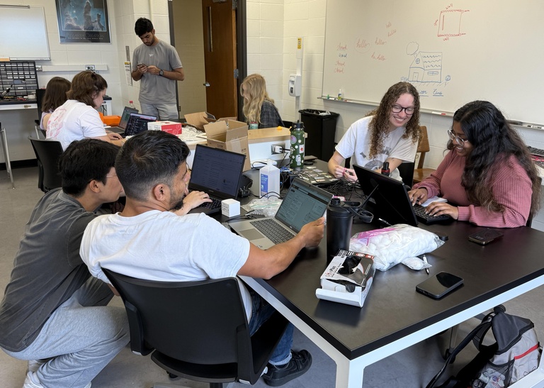 Edge of Space students collaborating on project