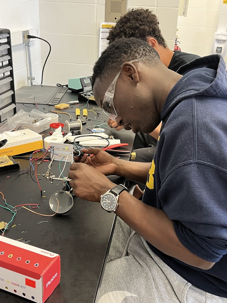 An Edge of Space Academy soldering