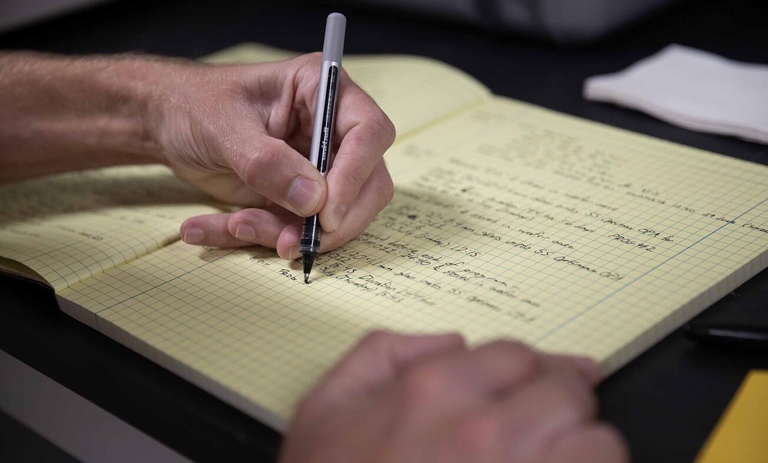 Jacob Payne writes in a logbook