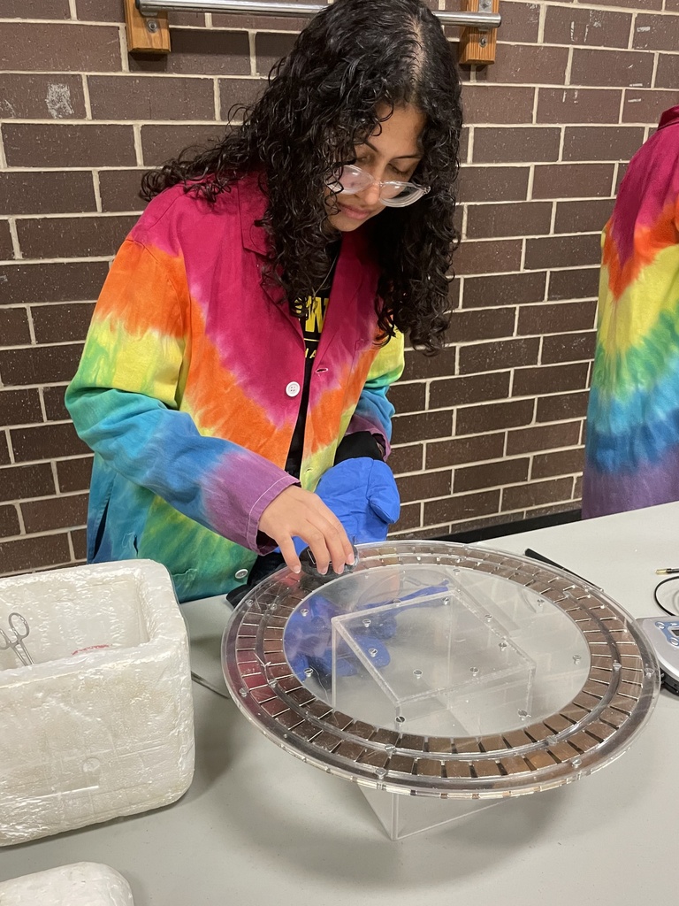 Arissa Khan presents physics demo at a school