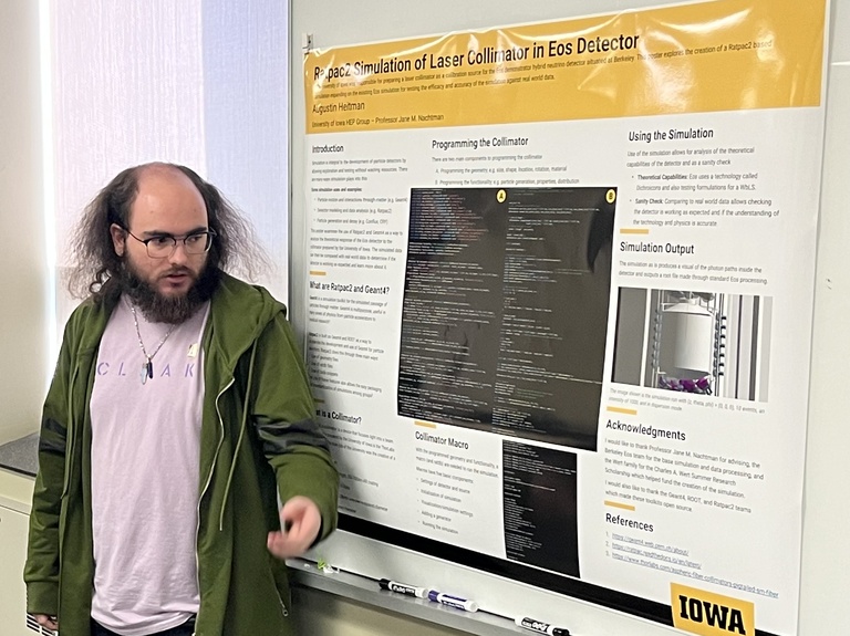 Augustin Heitman presents a poster at Acevedo Poster Contest