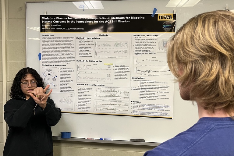 Arissa Khan presents a poster at Acevedo Poster Contest