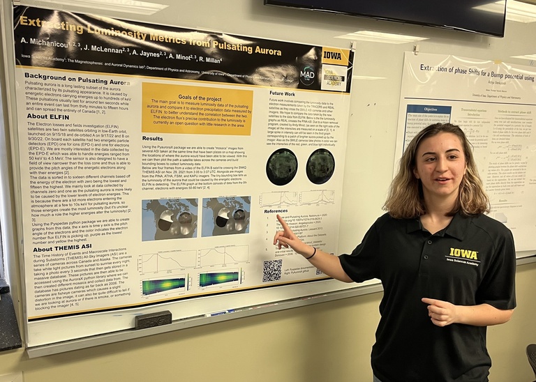 Alexi Michanicou presents a poster at Acevedo Poster Contest