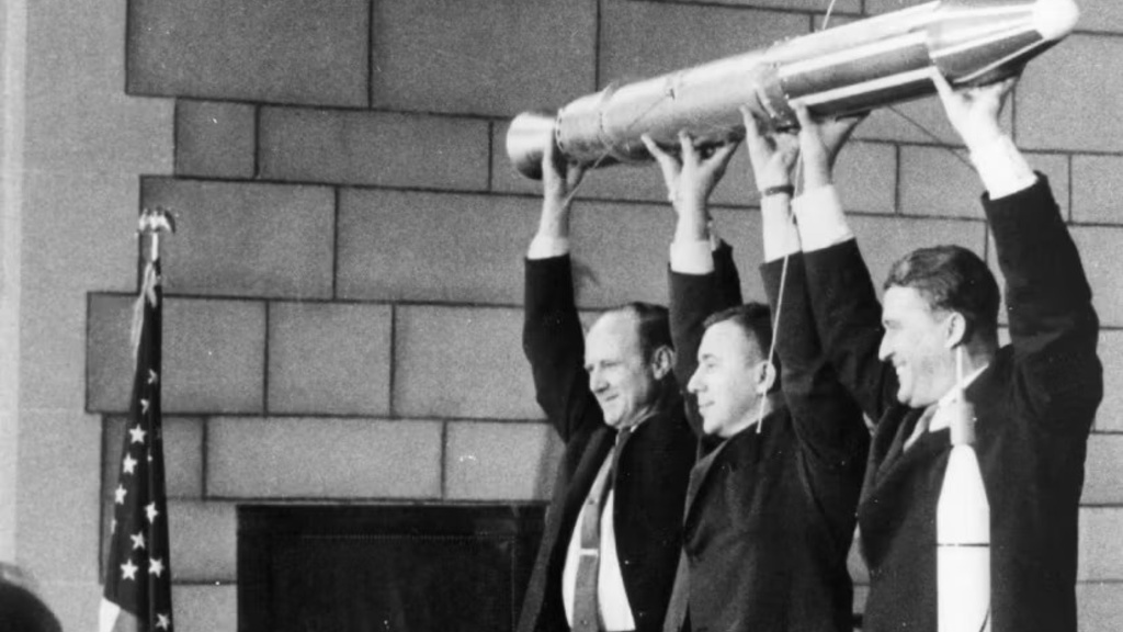 William Pickering, James Van Allen, Wernher von Braun, hoist a replica of Explorer 1, the U.S.’s first satellite, at a news conference in Washington, D.C., after confirmation that the satellite was in orbit. NASA